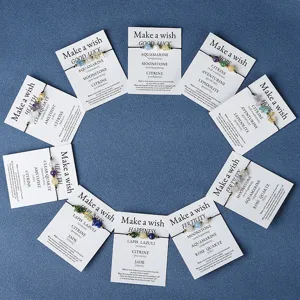 Circular layout of handmade stone wish bracelets on cards featuring Amethyst and Lapis