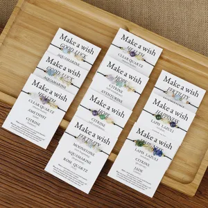 Handmade natural stone chip wish bracelets with gemstone meanings displayed on cards