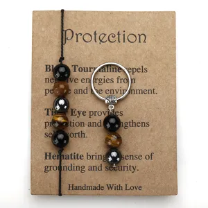 Handmade Tiger Eye and Hematite beaded bracelet and keychain set on a protection card