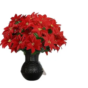 Künstlicher Weihnachtssterne Blumenstrauß in schwarzer Vase für Feiertagsdekoration