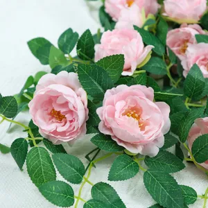 Artificial pink peony flower vine wall hanging for home decoration and floral arrangements.