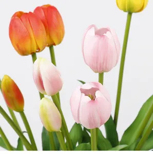 Close up of colorful artificial tulips flower details, realistic PU texture and vibrant green stems.