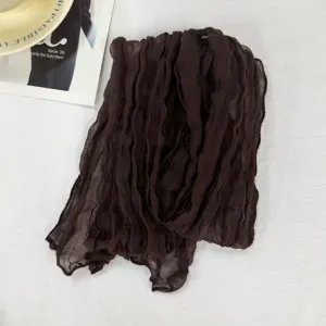 Dark brown crinkled long scarf for women, solid color voile fabric, narrow pleated design.
