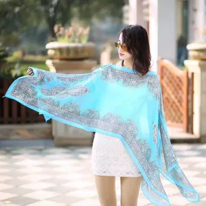 Light blue paisley print chiffon beach shawl with pearl buttons, elegant summer cape for women.
