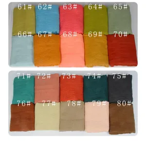 Affichage des options de couleur de foulard en lin de coton, montrant des teintes vibrantes.
