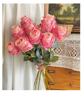 Vintage artificial silk rose bouquet fake flowers for home decoration and photography props.