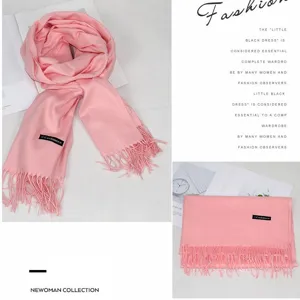 Solid pink cashmere-like winter scarf for women, thick tassel long shawl and cozy wrap.