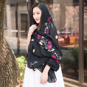 Cotton linen embroidered ethnic shawl scarf for women, elegant black floral wrap for travel.