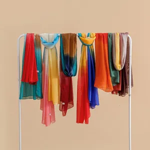 Colorful gradient scarves for women, lightweight travel shawls and stylish fashion accessories.