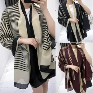 Detailed close-up view of women striped linen shawl, showcasing multiple color variants.
