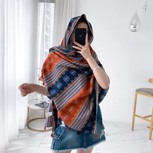 Detailed view of retro ethnic print linen scarf, versatile beach shawl for women.