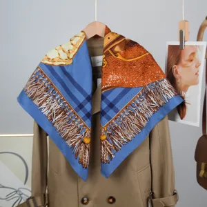 Luxury 90cm silk square scarf featuring saddle print, elegant blue and orange color block.