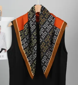 Color-blocked 68cm square scarf featuring vintage geometric print and luxurious silk-feel fabric for women.