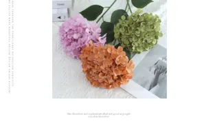 Detailed view of 3D printed simulation hydrangeas in pink, green, and orange colors.