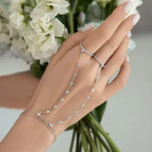 Detailed view of a 925 sterling silver finger chain ring featuring sparkling cubic zirconia stones