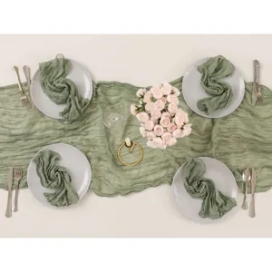 Elegante runner da tavola in garza verde salvia con tovaglioli abbinati per decorazioni boho