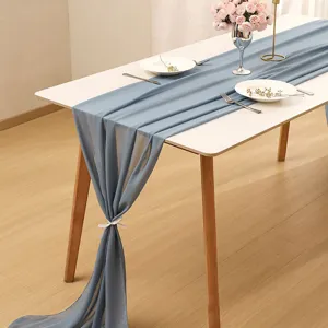 Elegant blue chiffon table runner for wedding banquet and party decoration on white table
