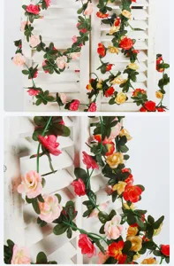 Detailansicht farbenfroher künstlicher Rosenranken an einem weißen Holzfensterladen