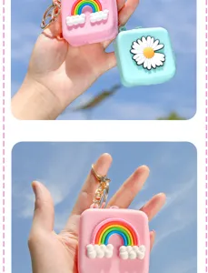 Macro view of creative silicone rainbow coin pouch with durable gold keychain attachment.