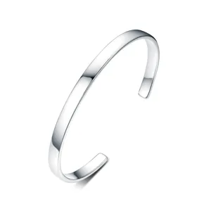 Close-up of minimalist 925 sterling silver cuff bracelet with polished finish