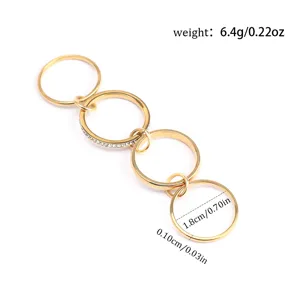 Detail of gold titanium steel stackable rings showing weight 6.4g and 1.8cm diameter