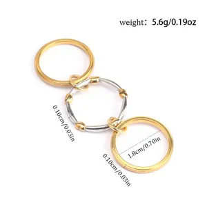 Macro view of triple-layer stacked titanium steel rings with dimension labels