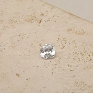 Close-up of cushion cut white cubic zirconia gemstone for customizable birthstone jewelry