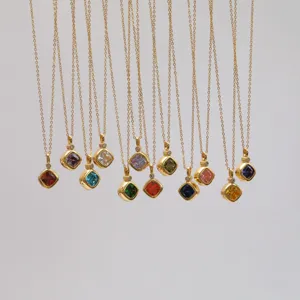 Detailed display of 12 different colorful birthstone pendants with 18K gold plating