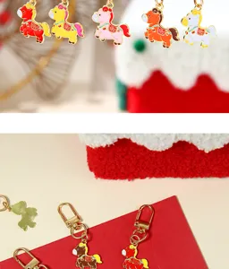 Close-up of vibrant enamel zodiac horse pendants on festive red background for gifts.