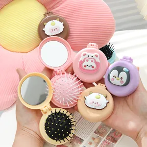 Cute portable cartoon folding hairbrush with mirror and massage air cushion for travel
