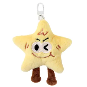 Simpatico portachiavi a forma di stella di peluche giallo con viso ricamato per borsa
