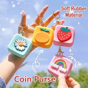 Cute silicone keychain coin purse set with cartoon patterns including strawberry and rainbow