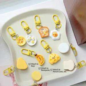 Cute simulation food resin keychains featuring fried egg, toast, and cheese designs