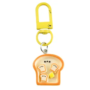 Creative simulation bread toast resin keychain pendant featuring cute butter and tiny toast slices