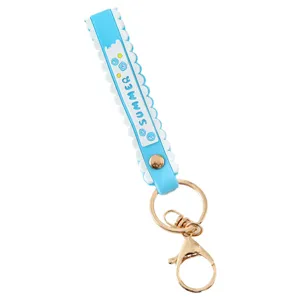 Light blue and white silicone wrist strap keychain with SUMMER print for bag charm