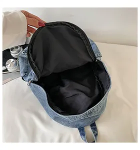 Gedetailleerd overzicht van vintage denim rugzak interieur met grote opslagcapaciteit ontwerp.