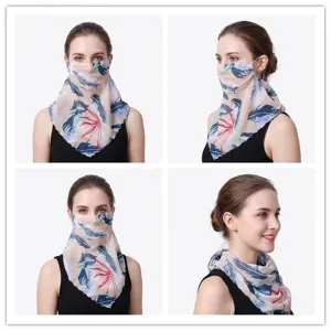 Detailed view of floral chiffon sun protection face mask with ear loops for women