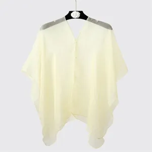 Front view of a light yellow sheer chiffon sunscreen shawl displayed on a hanger
