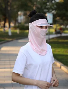Detailed view of the pink ice silk sun protection mask and facekini on model
