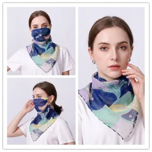 Floral chiffon sunscreen face mask providing UV protection for the face and neck area.