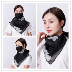 Detail shot of black floral chiffon sun protection mask for women with neck guard
