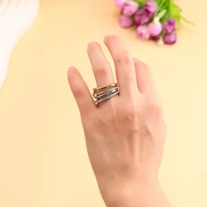 Macro view of minimalist three-layer stacked rings with sparkling CZ on a hand
