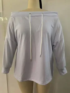 Detailed front view of a lavender off-the-shoulder sweatshirt featuring white drawstrings