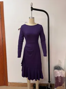 Side view detail of purple long sleeve dress with elegant irregular ruffled hemline