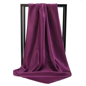 Elegant solid purple silk square scarf draped on frame for fashion head wrap