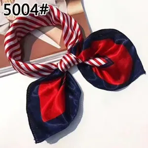 Detail view of a red and navy blue striped professional silk square scarf tied as a bow