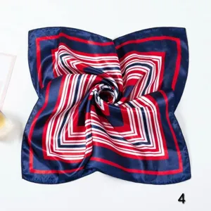 Close-up of navy and red striped silk square scarf with elegant spiral folding detail