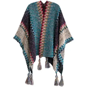 Bohemian knit poncho shawl with colorful zigzag pattern and tassels for autumn winter.