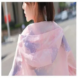 Close-up of pink breathable sun protection jacket with purple abstract print details