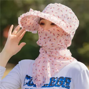 Floral print women's wide brim sun protection hat featuring a matching protective face cover